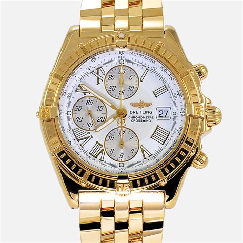 breitling gold chronograph.